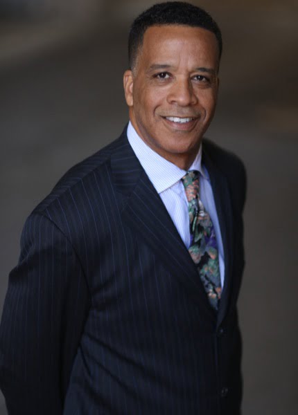 Photo of an older African American businessman. Compliance manager