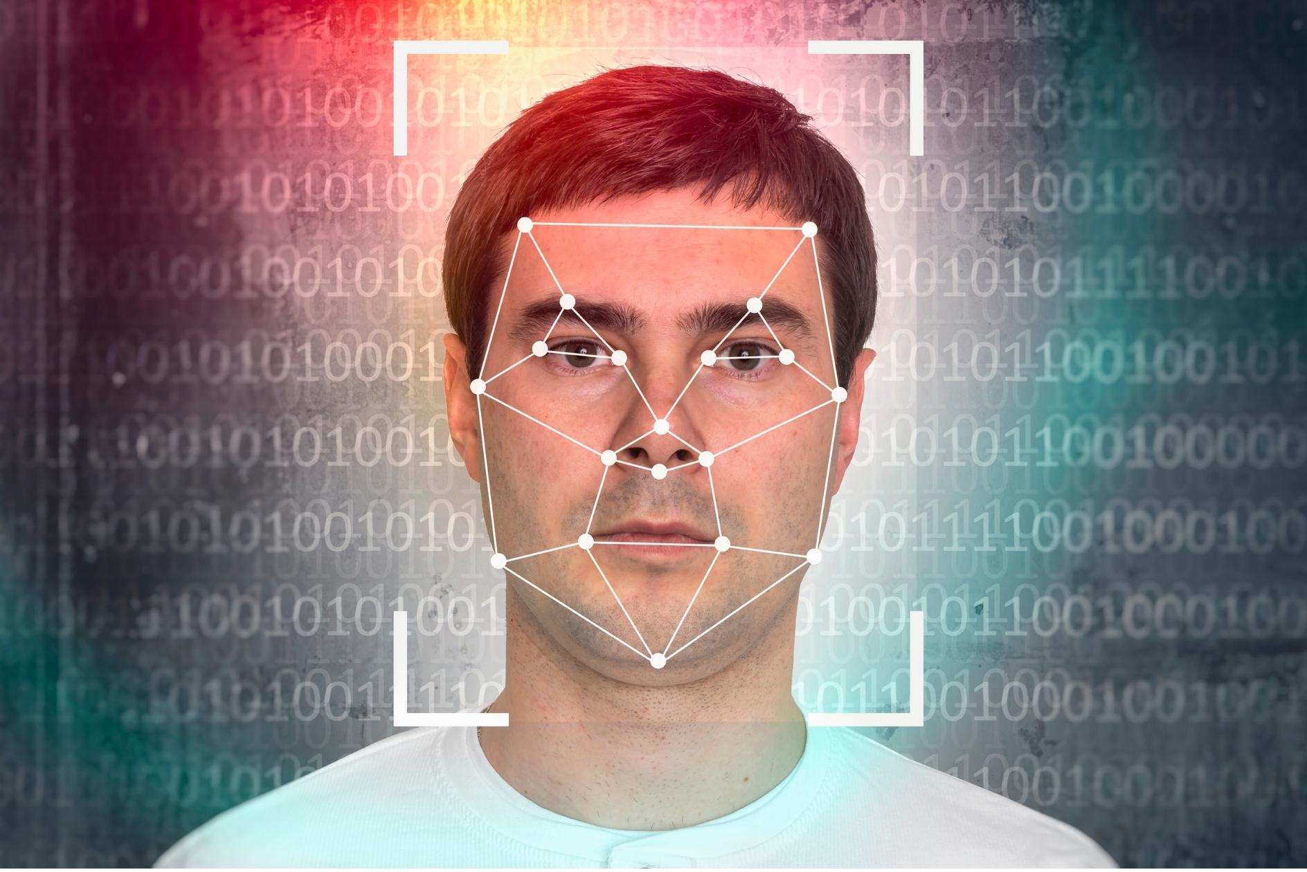 A person using facial recognition.