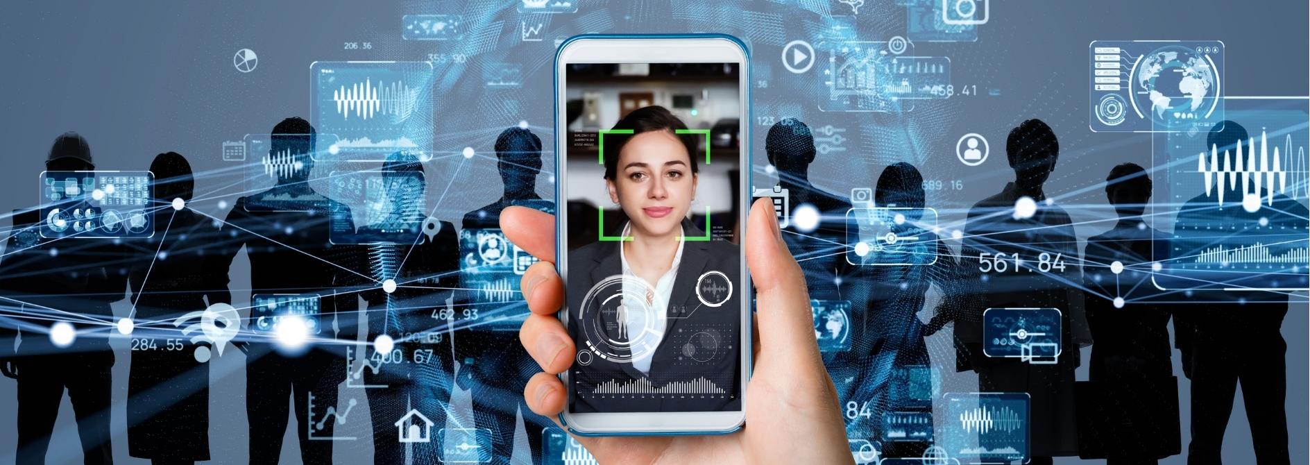 Someone holding their phone for biometric authentication among other individuals.