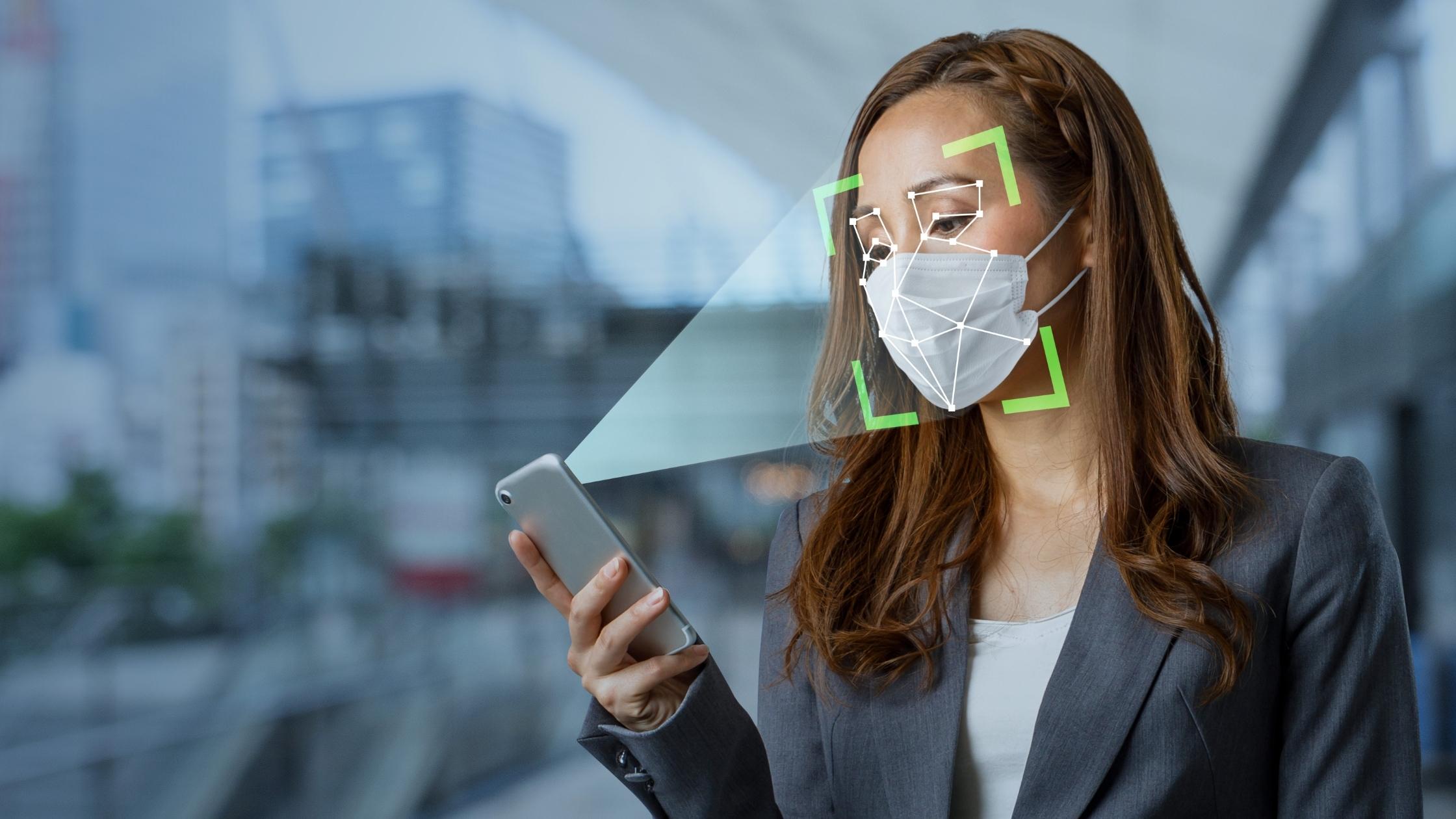 A person with a mask on busy with facial recognition.